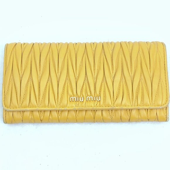 Miu Miu Handbags - Miu Miu Wallet Matelasse Flap Long Wallet Calfskin Mustard Yellow No Returns